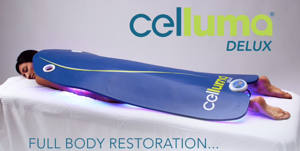 Woman with a full body celluma device covering her body